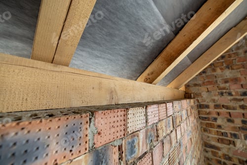 Preview: Interior of unfinished brick house with concrete floor, bare walls ready for plastering and wooden