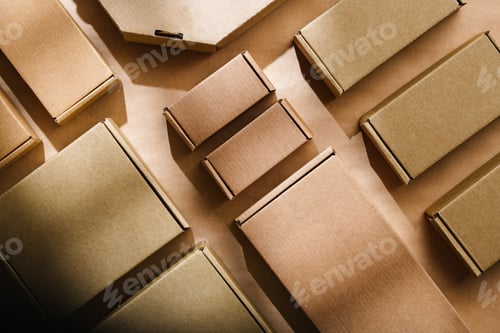 Preview: Multiple cardboard boxes arranged on a surface for packaging and shipping in a warehouse setting