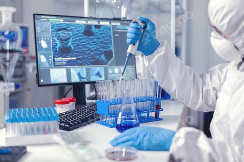 Preview: Medic assistant working in biochemistry lab working with automatic pipette