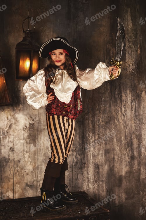 Preview: Full length of pirate showing with saber in underground room or hold of pirates ship