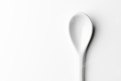 Preview: White spoon isolated on a white surface