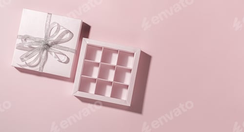 Preview: Candy gift box empty pink background. Template advertising chocolate sweets