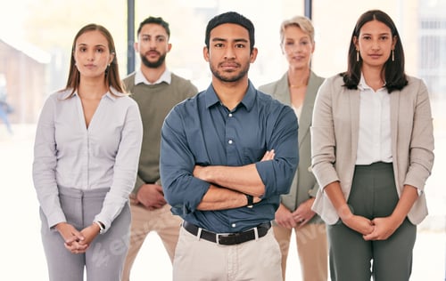 Preview: Shot of a diverse group of businesspeople standing together in the office