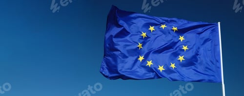 Preview: European Union EU flag waving in the wind over blue sky.