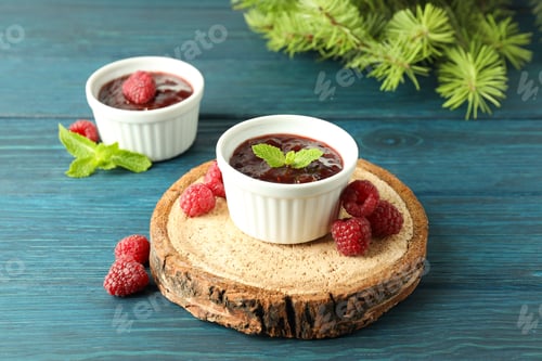 Preview: Concept of tasty food with raspberry jam on wooden background