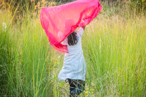Preview: Beautiful young girl outdoor enjoying nature. young girl in meadow.
