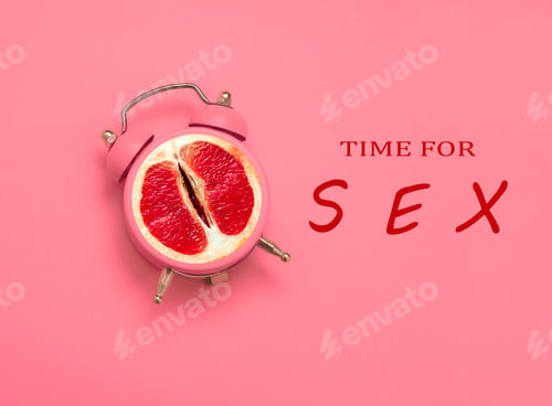 Red Fruit in Alarm Clock with Vulgar Message