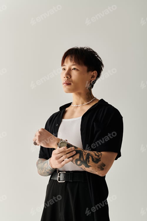 Preview: Stylish young Asian man posing confidently with watch in minimalist setting