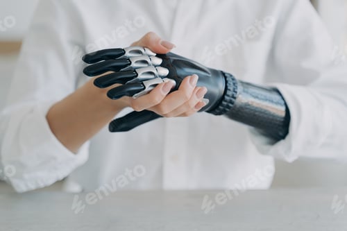 Preview: High tech carbon electronic hand. Modern technology for wellbeing. Rehabilitation after trauma.