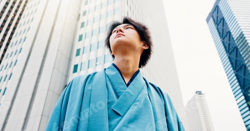 Preview: Japanese man, thinking and city travel with traditional clothes, outfit and yukata for heritage. Be