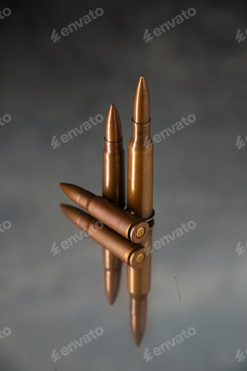 Preview: brown bullets on dark background shooting gun tank war