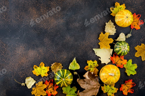 Preview: dark Autumn background with pumpkins, leaves