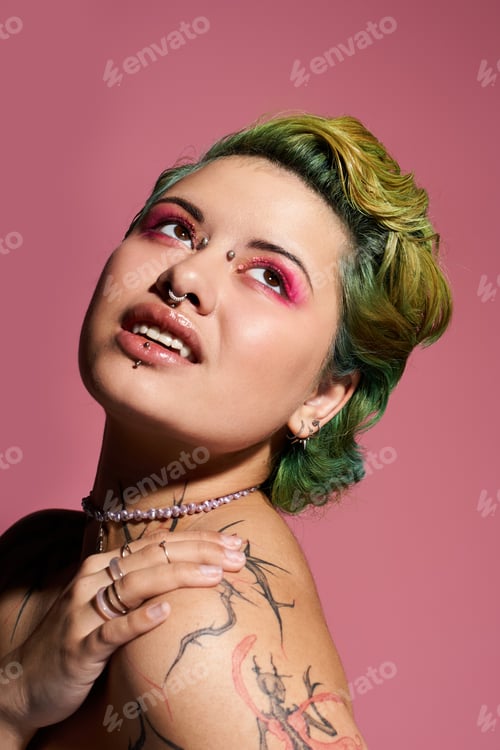 Preview: Vibrant young woman showcases bold fashion and striking makeup against a pink backdrop in daylight