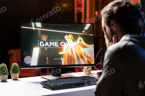 Preview: Player crying after losing while playing first person shooter videogame