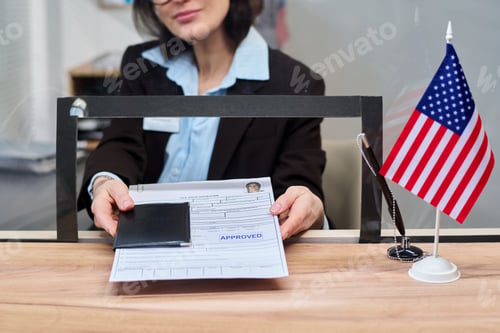 Preview: Middle Aged Woman Handing Approved Visa Documents at Visa Center