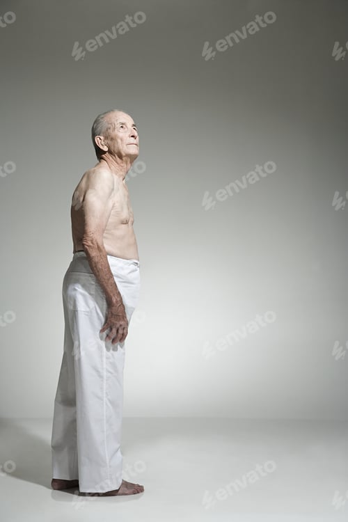 Preview: Senior man looking up
