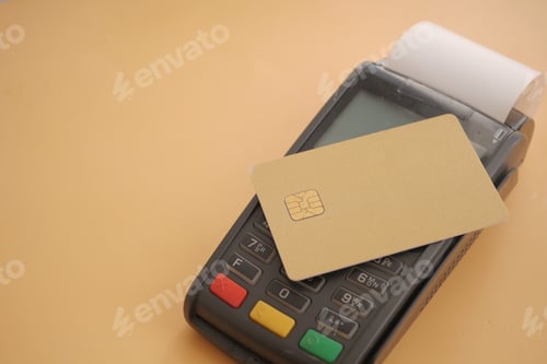 Preview: Payment terminal with card on countertop in retail space