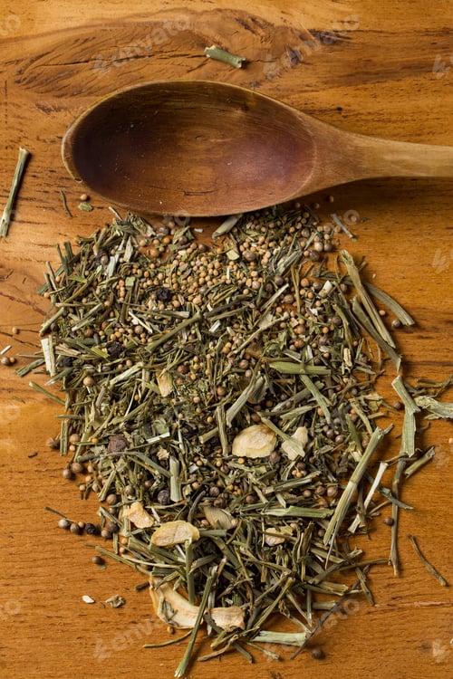 Preview: Spoon and heap of greens on the table