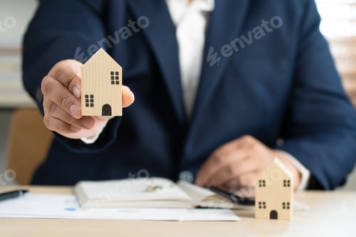 Preview: Real estate agent broker or realtor with house and contract plan document paper
