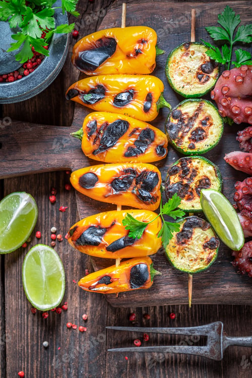 Preview: Hot grilled skewer with peppers, tomatoes and zucchini.