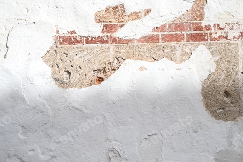 Preview: Textured white concrete wall background with brick