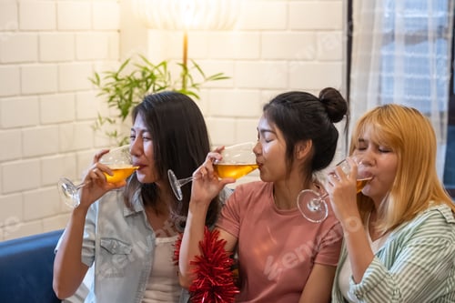 Preview: group of asian woman friend celebrate new year party at night at home