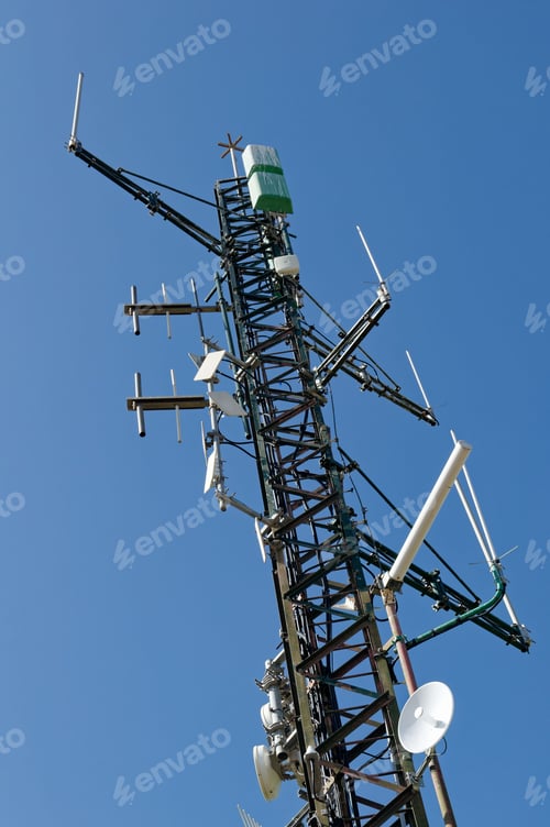 Preview: low angle view of a cellphone tower in Denia, Spain