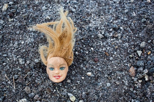 Preview: doll head in the mud