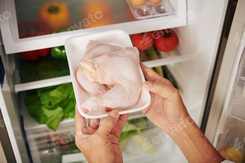 Preview: Taking package of chicken meat