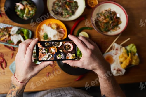 Preview: Chef Taking Photo of Asian Food