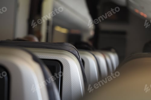 Preview: Passengers seated in an airplane preparing for takeoff