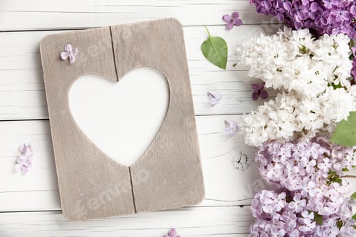 Preview: Spring background with flowers and photo frame