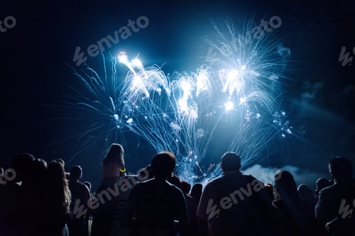 Preview: Crowd watching fireworks and celebrating new year eve