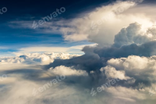 Preview: blue sky with the clouds from the plane view