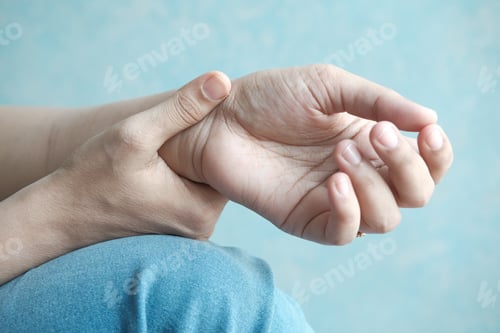 Preview: Young women hands suffering wrist pain,