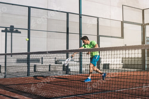 Preview: Man playing padel