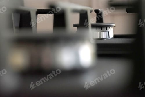 Preview: Gas cooker with burning fire propane gas. Blue flames on gas stove burner