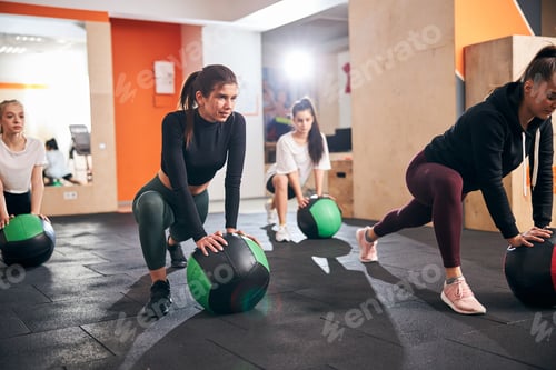 Preview: Fit young ladies using special gym balls for exercising