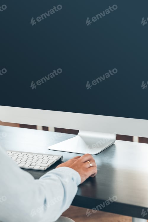 Preview: business man working in an office at his workplace
