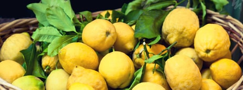 Preview: basket with ripe lemons