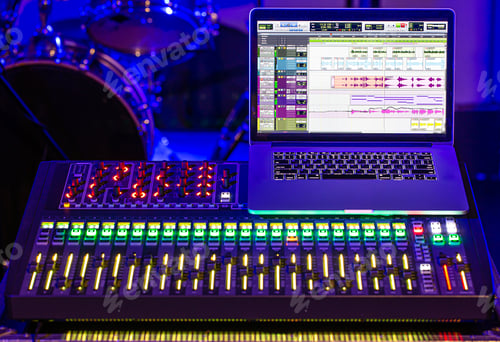 Preview: Digital mixer in a recording Studio, with a computer for recording sounds and music.