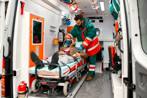Medical Professional Attending to Patient in Ambulance