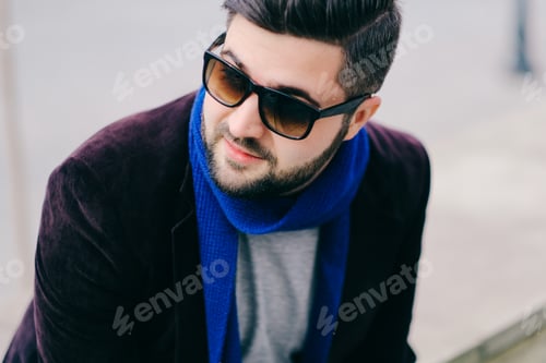Preview: Handsome young man on a walk in town