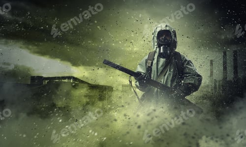 Preview: Man In Gas Mask And Camouflage Holding Gun. Disaster Concept