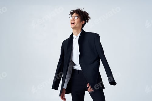 Preview: business man in suit wearing glasses lifestyle studio fashion