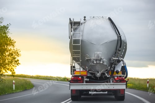 Preview: Long vehicle truck with tank trailer on a highway.