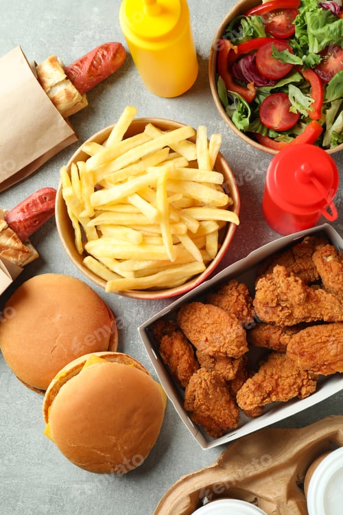 Preview: Tasty fast food on gray textured table