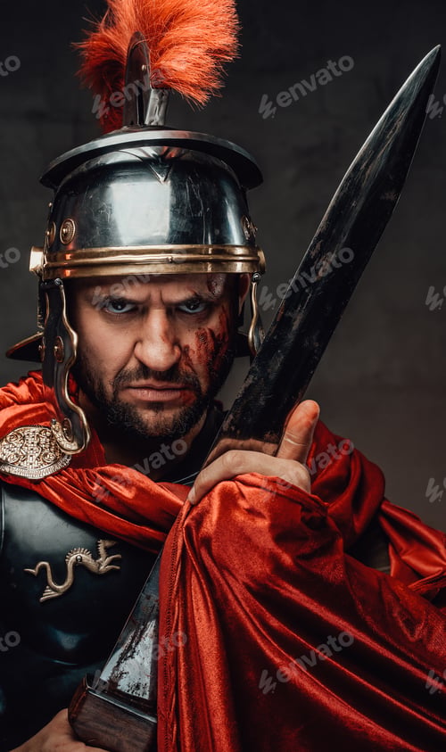 Preview: Angry roman warrior staing at camera in dark background