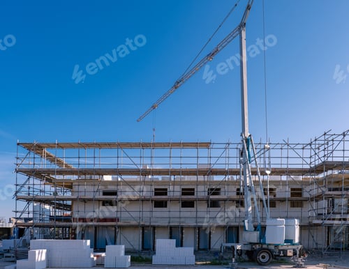 Preview: construction site of building new house, Dutch Suburban area with modern family houses