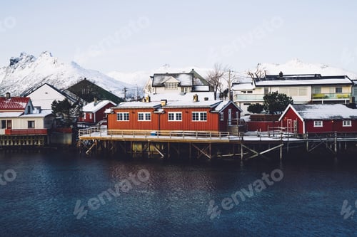 Preview: Small houses on shore blue fjord